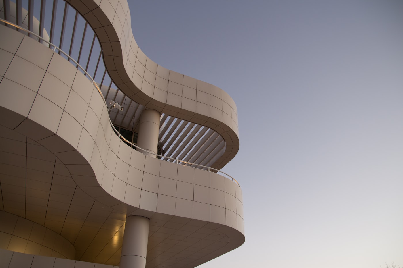 Curved modern architecture against the sky