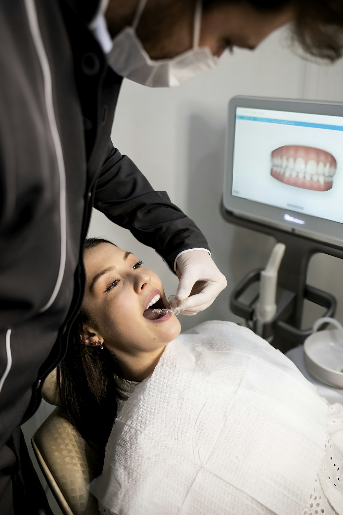 Dentist examining a patient's teeth